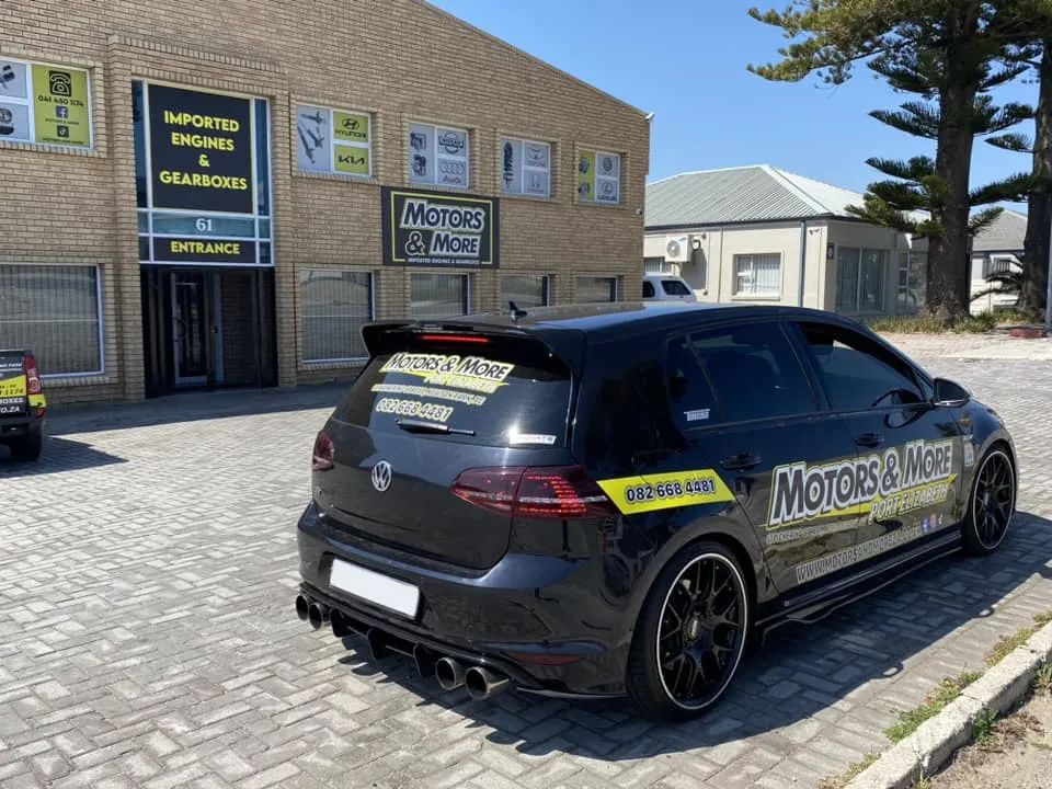 Front of Motors & More Gqeberha building with branded car parked outside