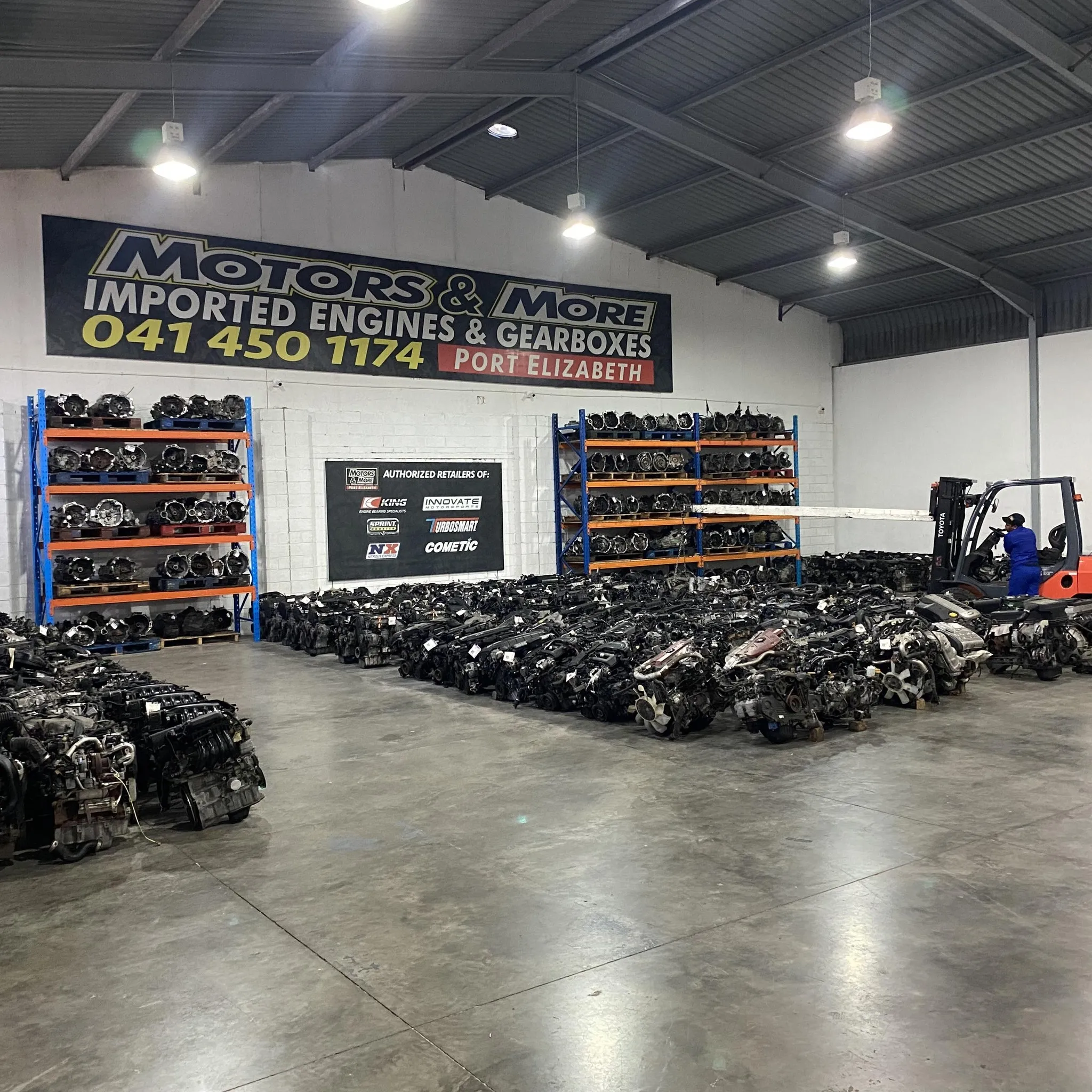 Side view of used engines in Motors & More Gqeberha warehouse