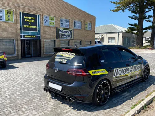 Front of Motors & More Gqeberha building with branded car parked outside